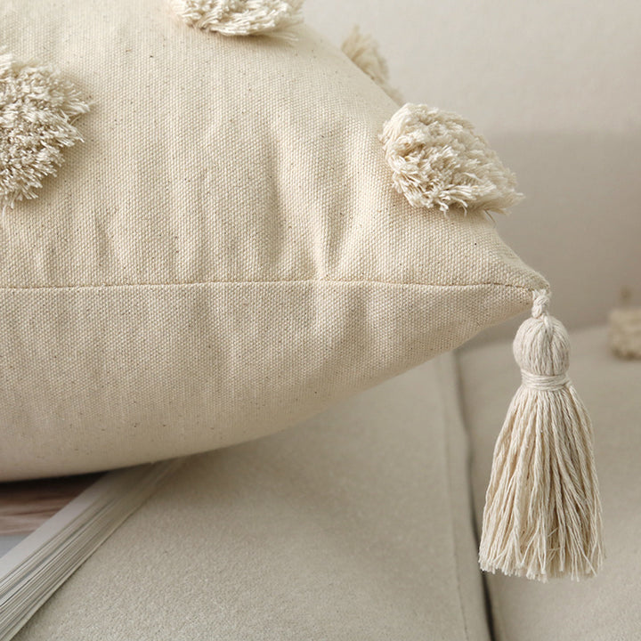Square cotton-linen cushion cover with 3D pompom tufting and corner tassels Kalsten
