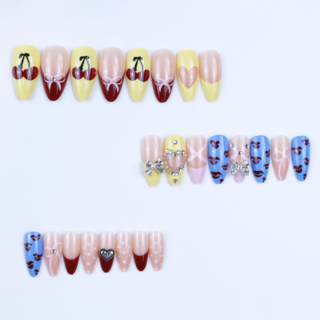 Artificial nails with playful design and 3D embellishments Kalsten