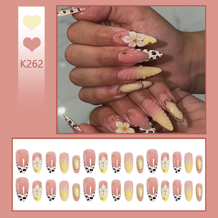 Artificial nails with floral patterns and golden accents Kalsten