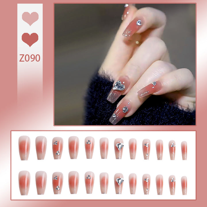 Acrylic nail set with elegant heart and rhinestone decorations Kalsten