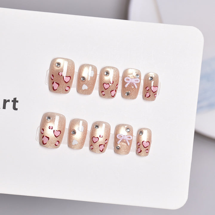 Artistic Press-On Nail Set with Heart and Bow Designs Kalsten