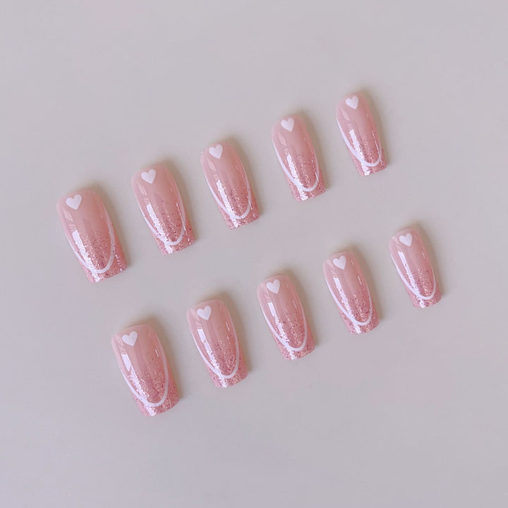 Nail art set with romantic heart designs and glamorous accents Kalsten