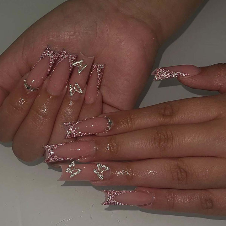 Glamorous stiletto artificial nails with glitter and crystal elements Kalsten