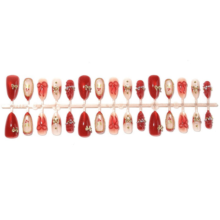 Artificial nail set with glamorous decorations and festive accents Kalsten