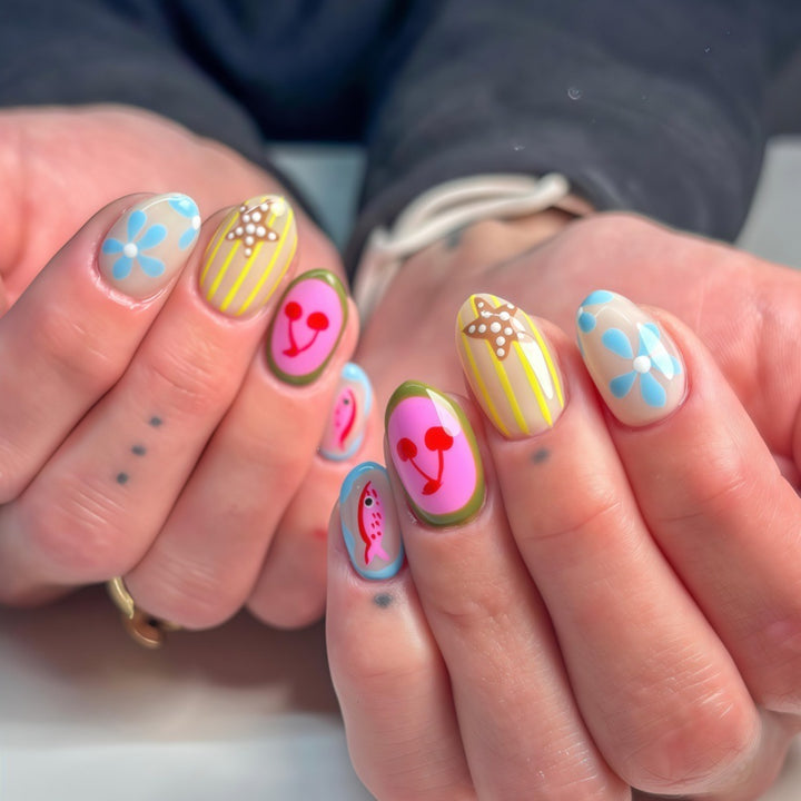Artificial nails with playful fruit and flower motif Kalsten