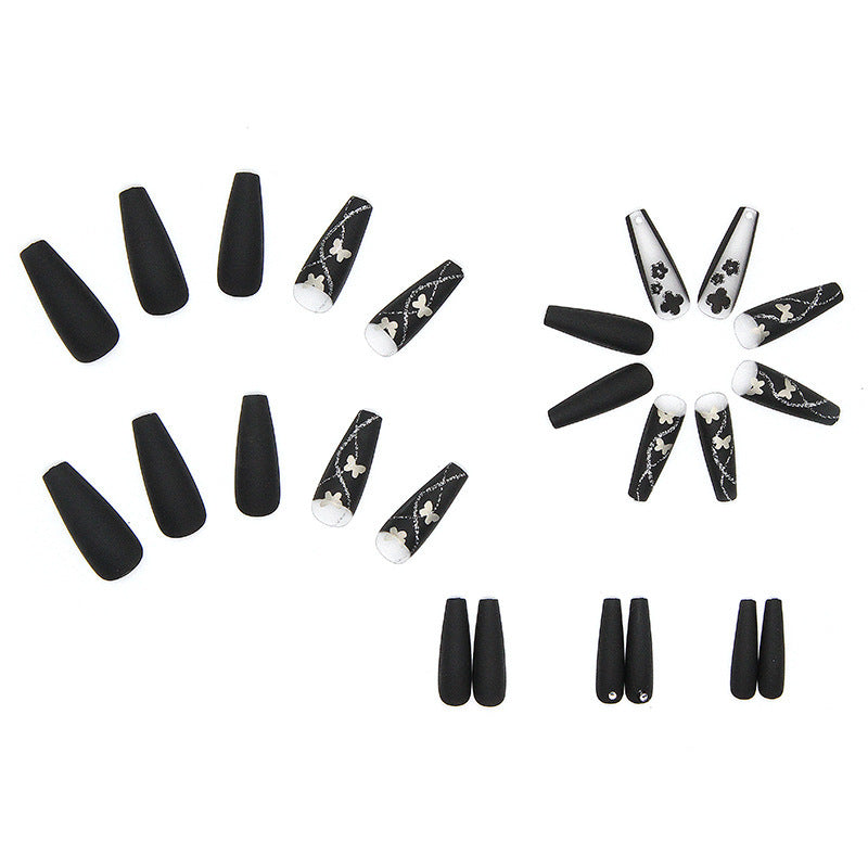 Art nail set with elegant butterfly and flower motifs Kalsten
