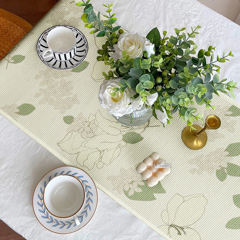 Woven table runner with floral jacquard pattern and fringed edge Kalsten