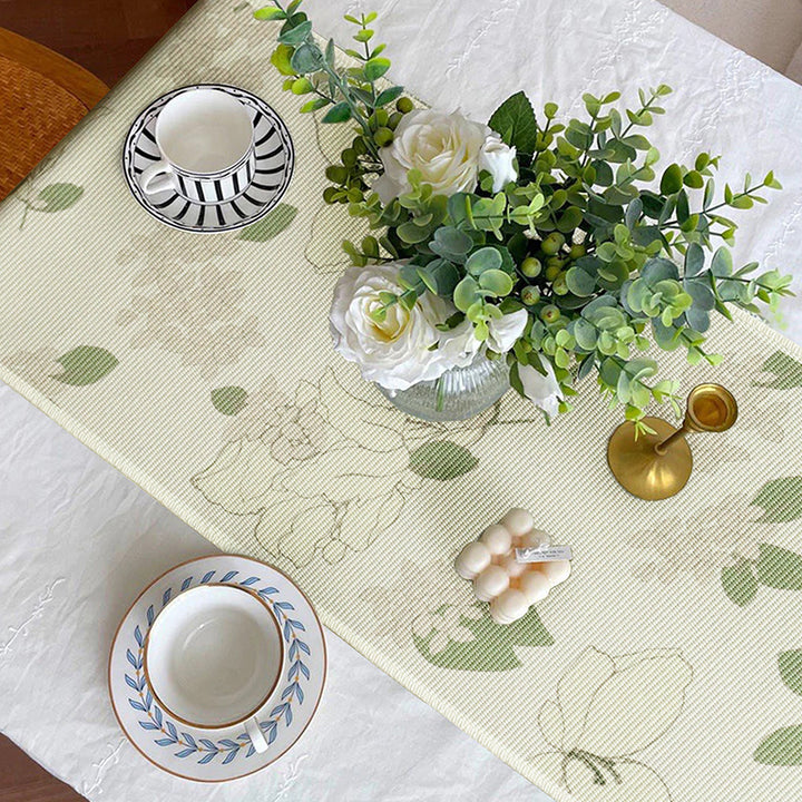 Woven table runner with floral jacquard pattern and fringed edge Kalsten