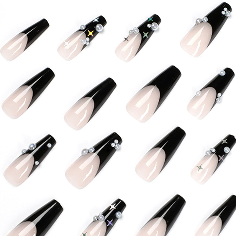 Artificial nail art with pearl and shine elements Kalsten