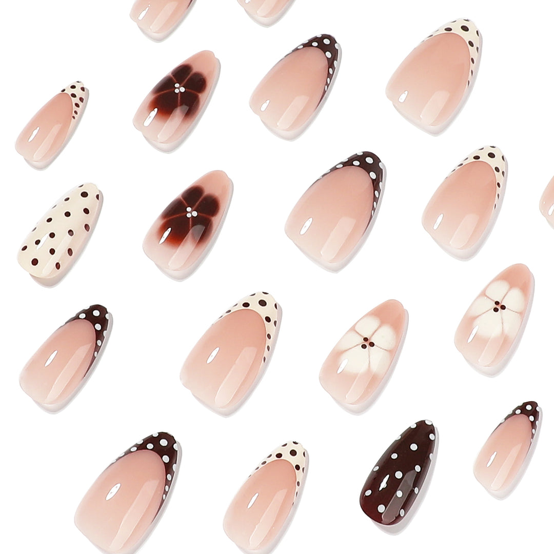 Artful nail art with floral design and various patterns Kalsten