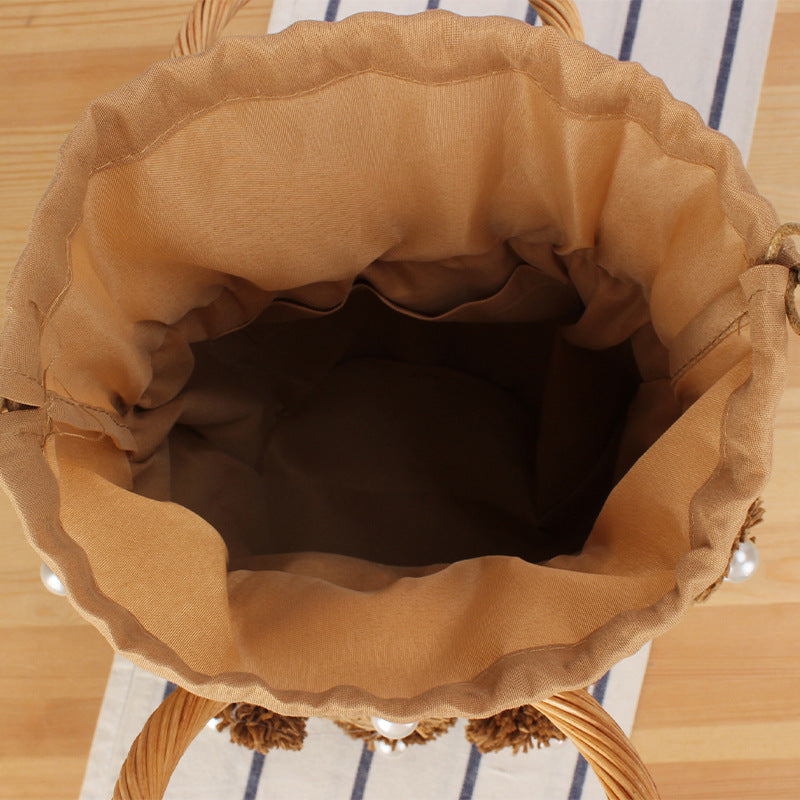 Handcrafted basket bag with bead appliqués Kalsten