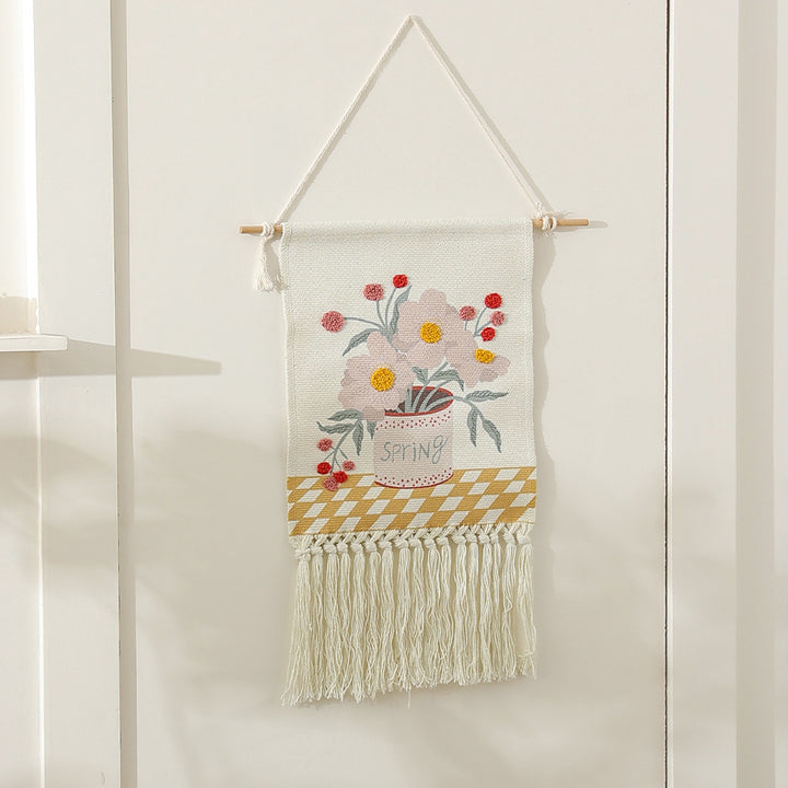 Woven cotton wall hanging with punch needle flower relief and fringes Kalsten