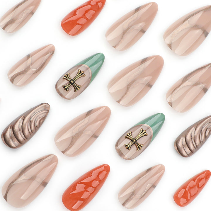 Artful stiletto nails with glitter and motif decorations Kalsten