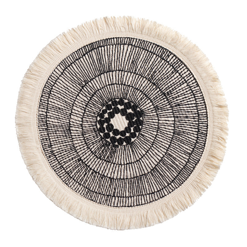 Round woven Boho rug mat with decorative fringes Kalsten