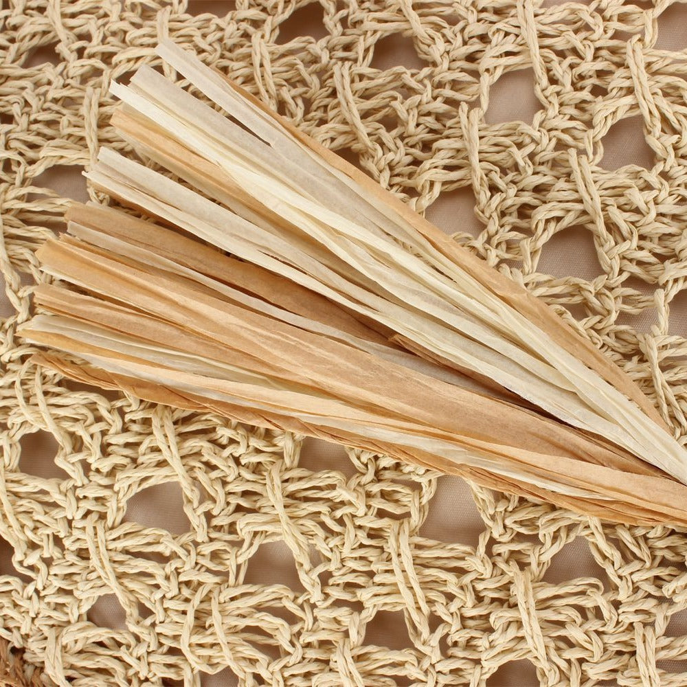 Handbag Made of Hand-Woven Natural Material with Appealing Tassel Detail Kalsten