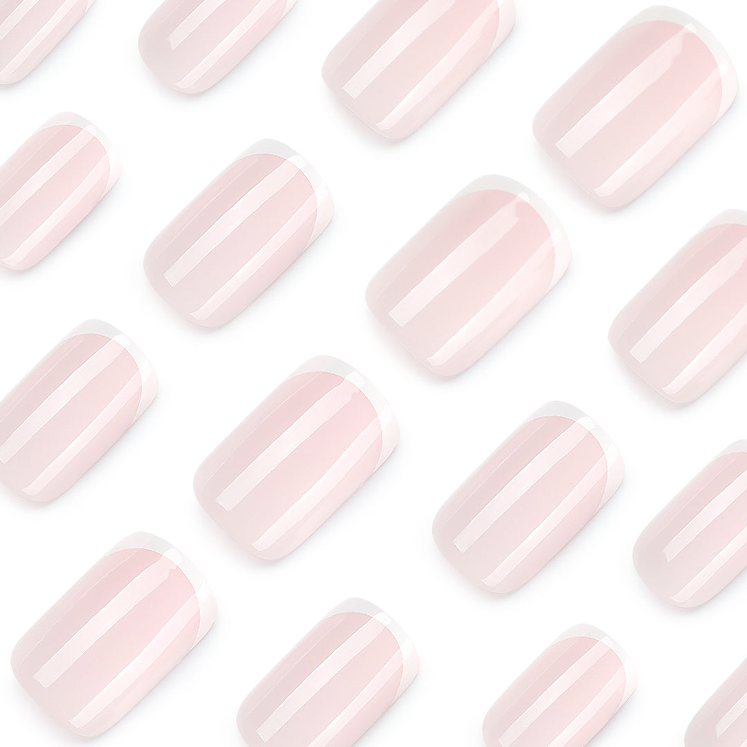 Classic nail extensions with elegant French tips Kalsten