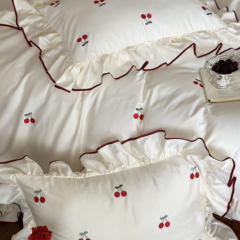 Luxury bedding set made of cotton satin with ruffles and cherry embroidery