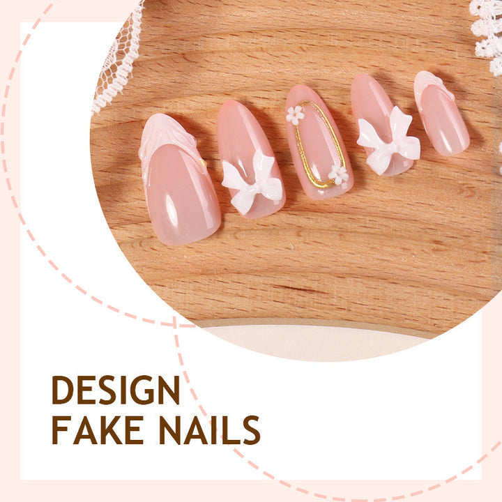 Artificial nail set with playful bow accents and delicate embellishments Kalsten