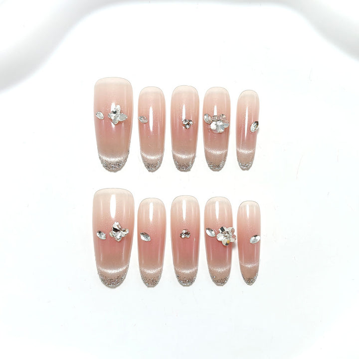 Glamorous artificial nails with rhinestone decorations Kalsten