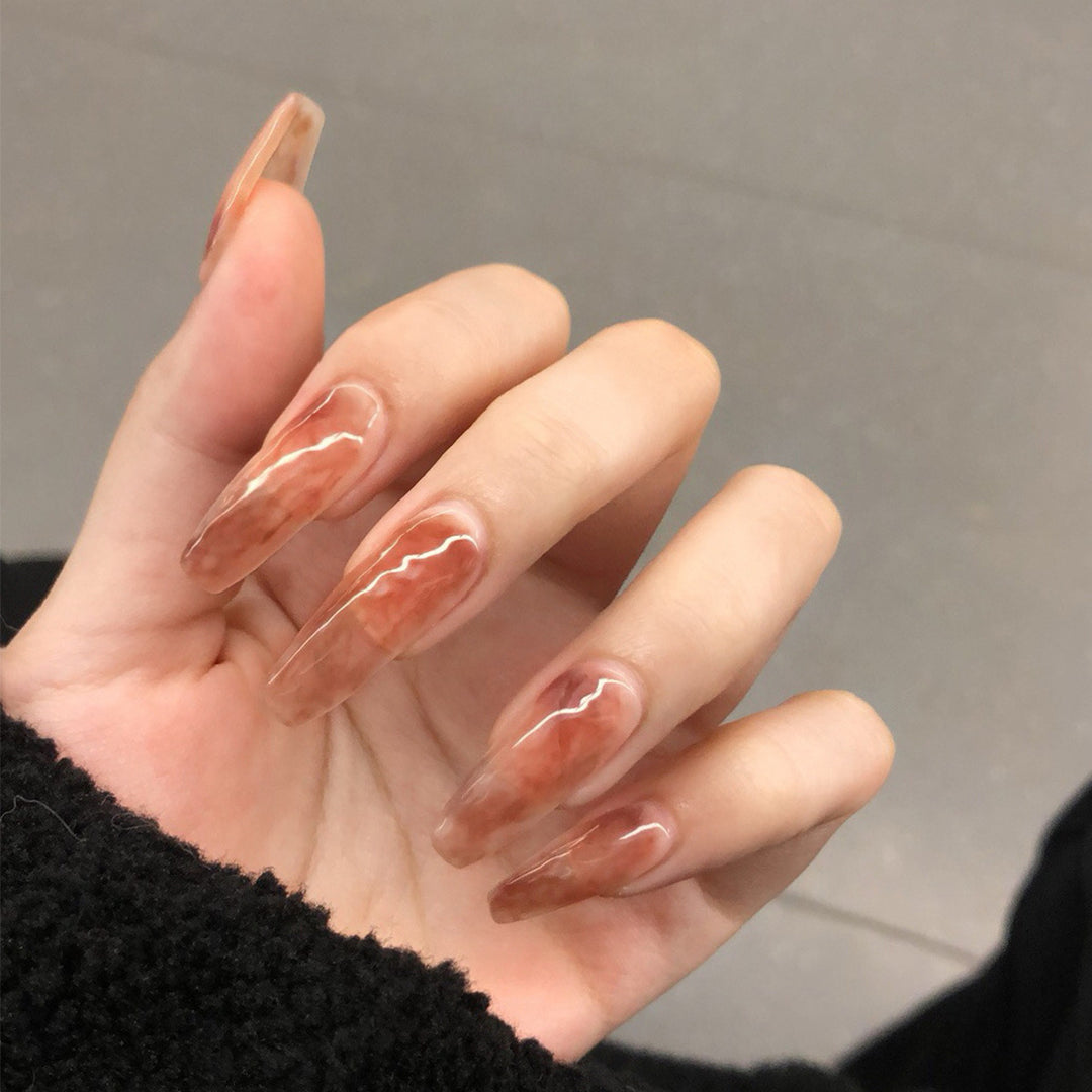 Artistic stiletto nails with elegant design Kalsten