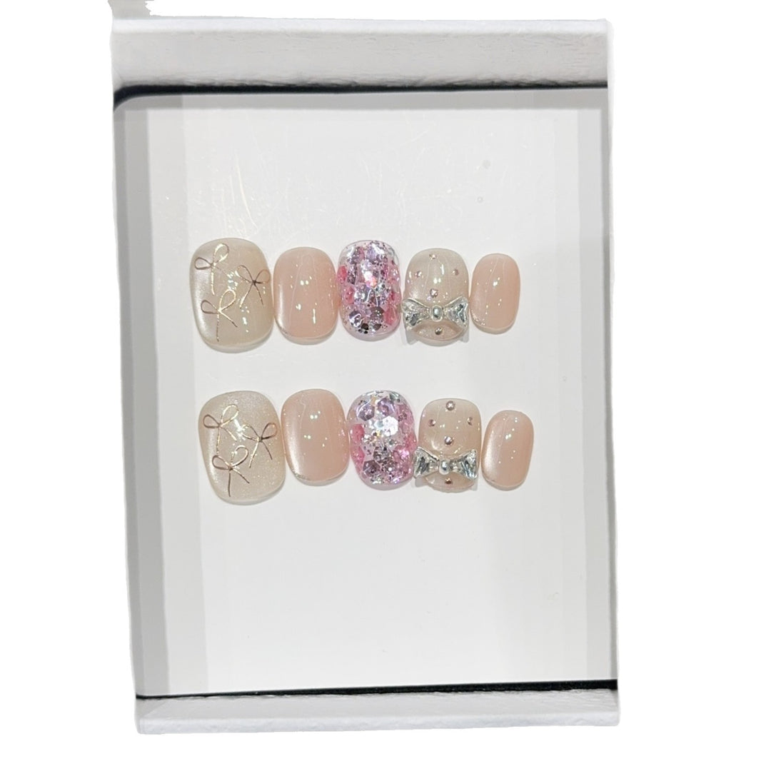 Artificial nails with romantic bow design Kalsten