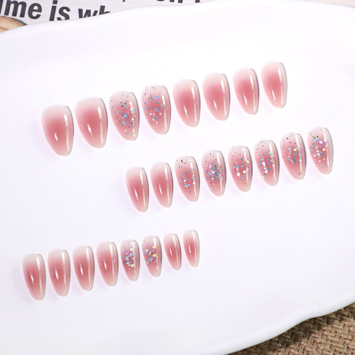 Glittering nail extensions with elegant V-design Kalsten