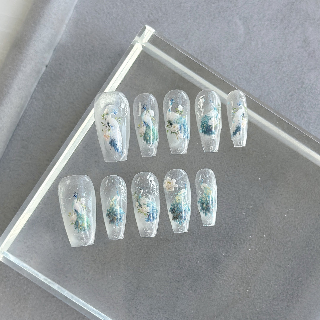 Artistic Press-On Nail Art Set with Heart and Celestial Designs