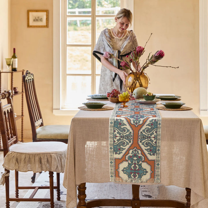 Woven table runner made of cotton blend with oriental medallion pattern and fringes Kalsten