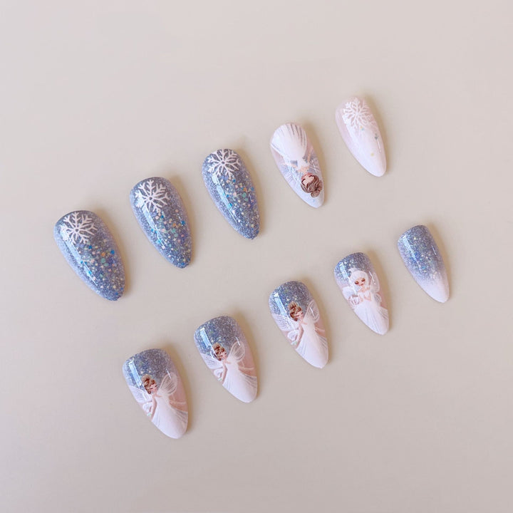 Nail art set with enchanting fairy motifs and glitter accents Kalsten