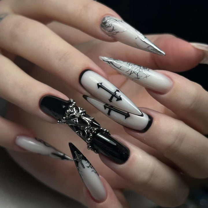 Artistic stiletto nails with unique 3D details and elegant accents Kalsten