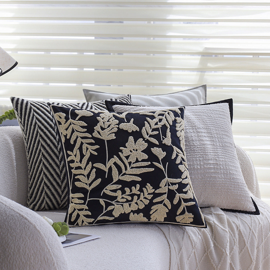 Square cushion cover with subtle herringbone texture and surrounding piping seam Kalsten