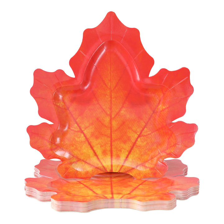 Disposable paper plates in pumpkin shape with spooky face design