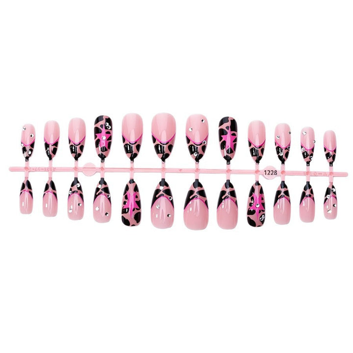 Nail set with glamorous leopard design and glitter elements Kalsten