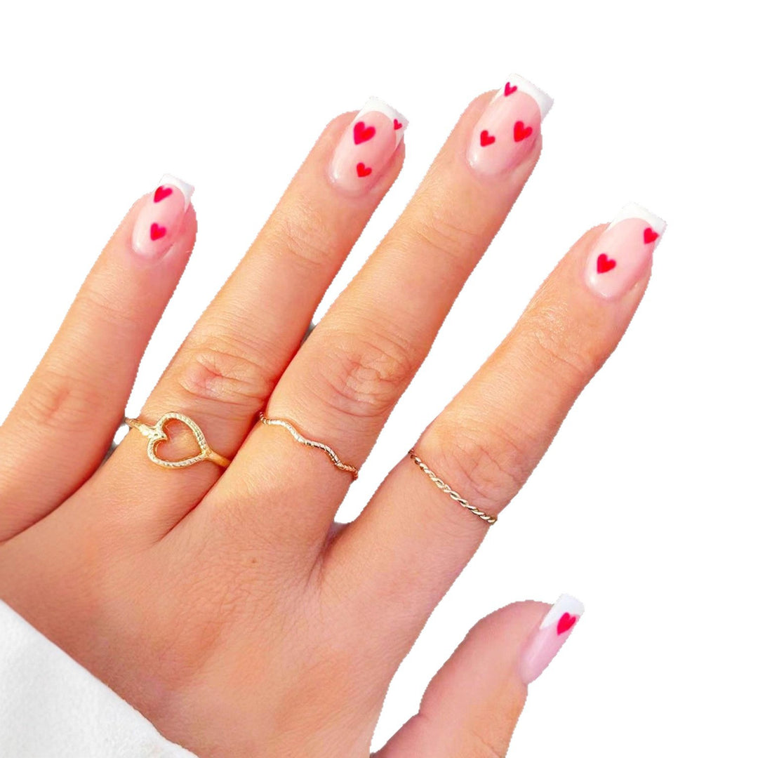 Elegant Heart-Embellished Nail Art Design Kalsten