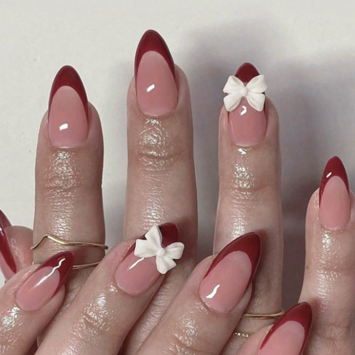 Acrylic nail set with elegant lace design and romantic bows Kalsten