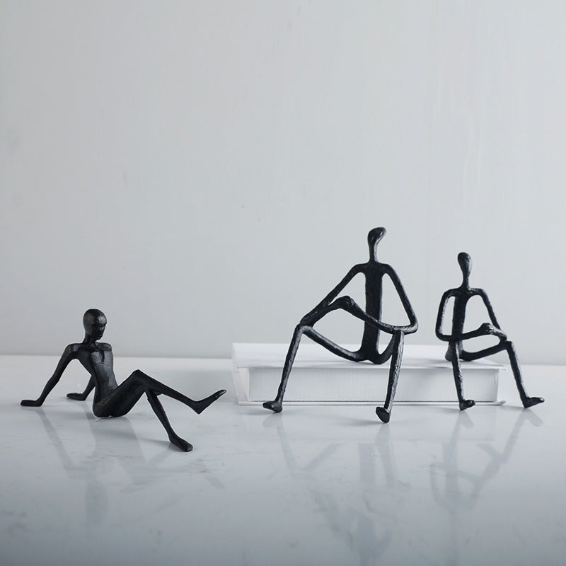 Artistic Sitting Figure Sculpture