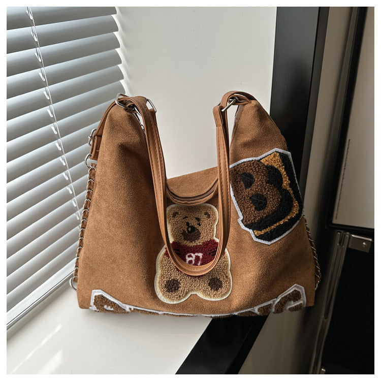Shoulder bag in playful bear pattern Kalsten