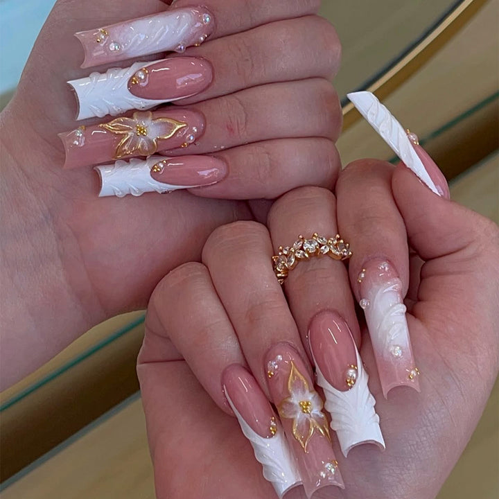 Artificial nails with handcrafted floral accents Kalsten