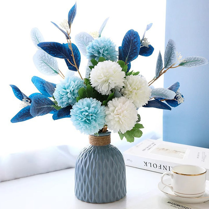 Decorative Floral Arrangement with Stylish Vase