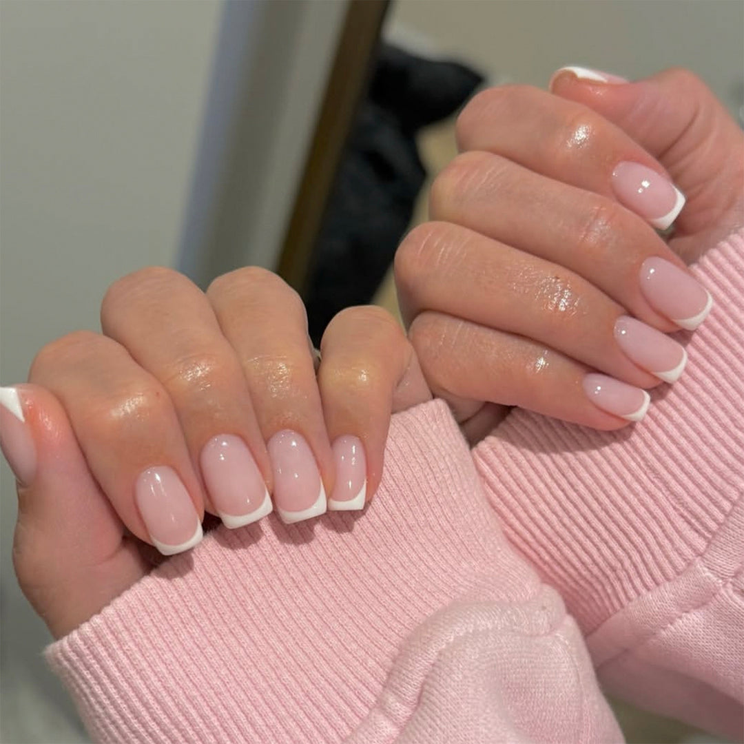 Elegant high-gloss nail art with French design Kalsten