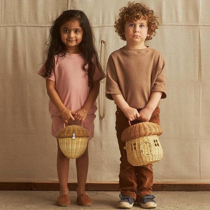 Playful hand basket in house design Kalsten