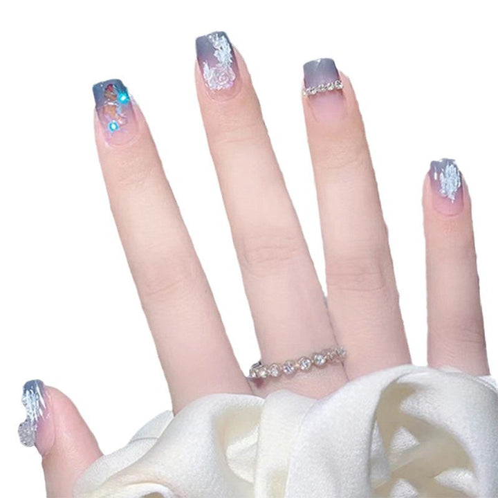 Glamorous artificial nails with heart and glitter details Kalsten