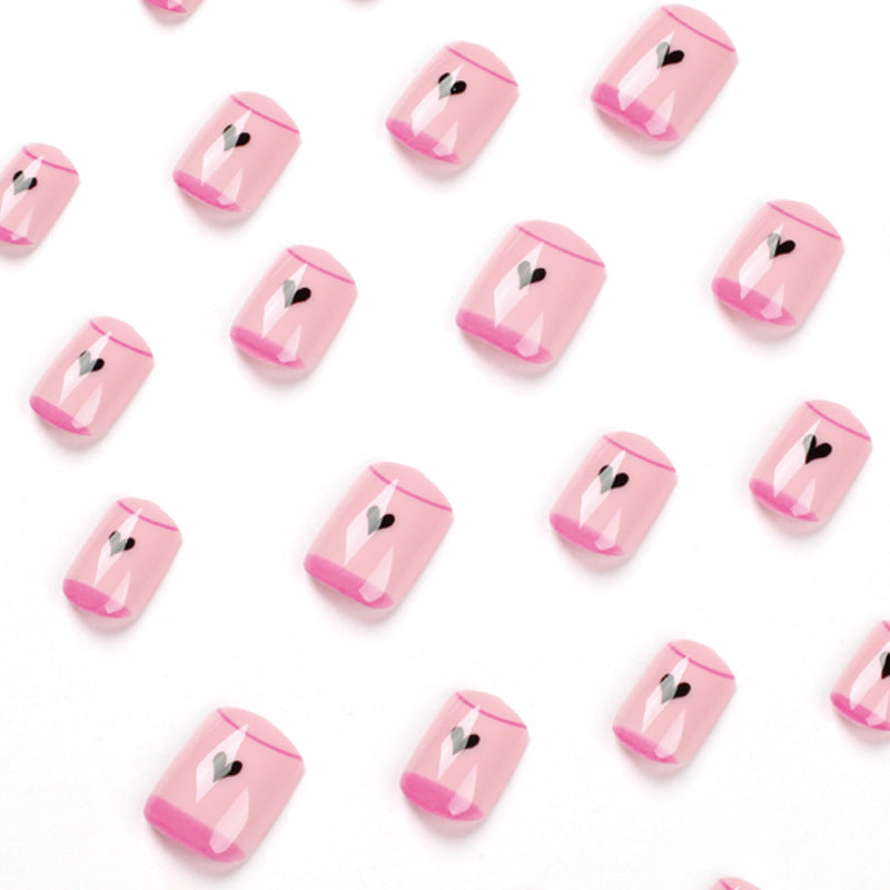 Creative Nail Art with Heart Design and Glitter Accents Kalsten