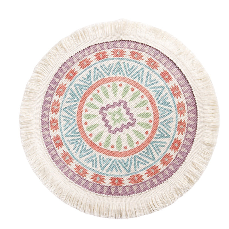 Round flat-woven cotton rug with mandala design and decorative fringes Kalsten