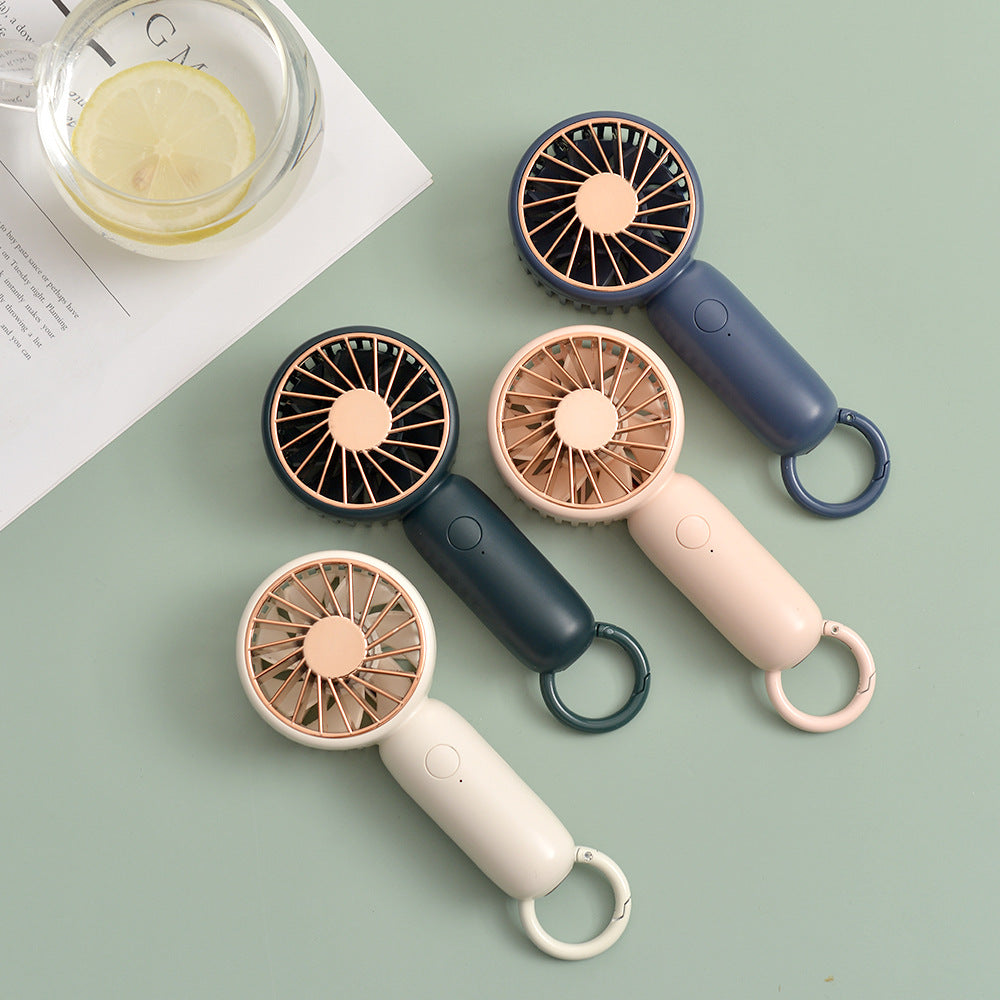 Cooling compact rechargeable handheld fan with carabiner loop and whisper-silent motor Kalsten