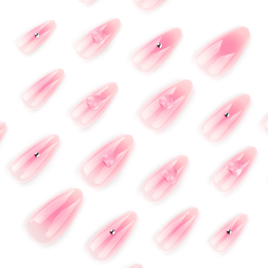 Artful stiletto nails with heart design and glitter accents Kalsten