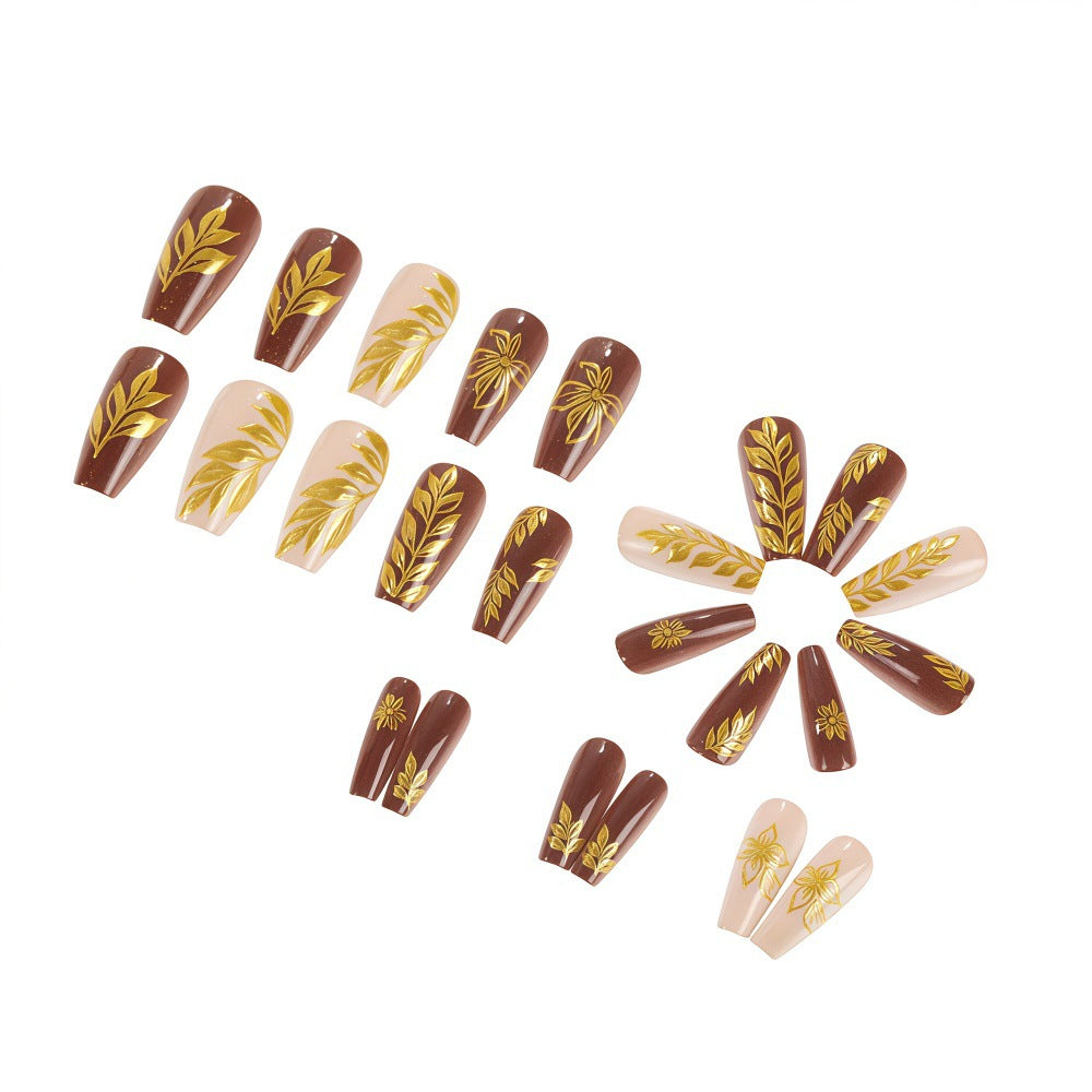 Artificial nails with floral gold design Kalsten