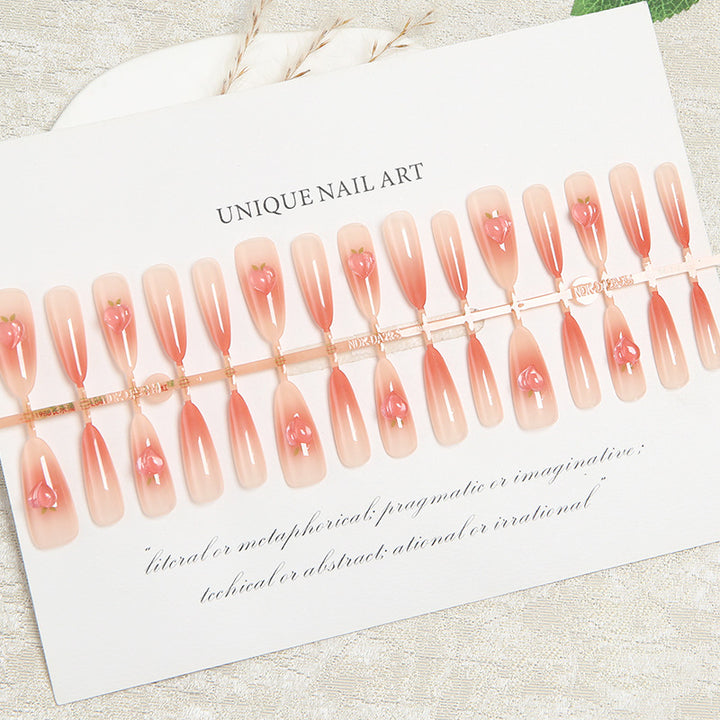 Nail set in elegant ombre design with artistic accents Kalsten