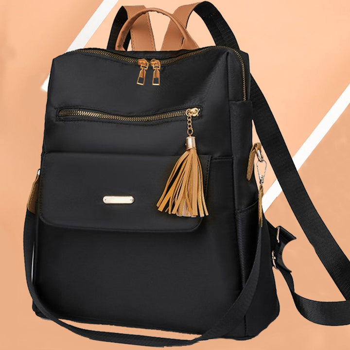 Multi-Functional Backpack with Decorative Tassel Kalsten