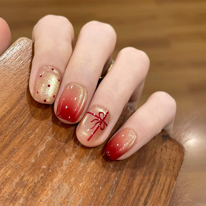 Artificial nails with festive gradient color and elegant decorations Kalsten